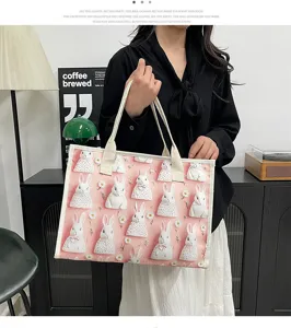 Detailansicht der lässigen Damen Canvas Tragetasche mit Hasen-Print, große Schultertasche.
