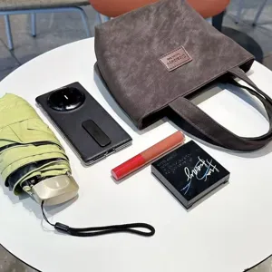 Casual brown PU leather tote bag for women, large capacity minimalist daily commuting handbag.