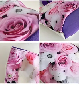Close-up of canvas handbag fabric texture, exquisite floral print, and neat stitching craftsmanship.
