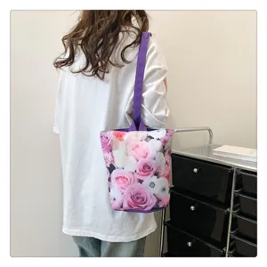 Canvas bucket bag with elegant pink rose floral print and purple straps for daily.
