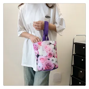 Floral canvas handbag with purple handle, stylish casual tote bento bag for women.