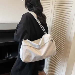 Large capacity sports gym bag for women, stylish travel luggage shoulder bag, lightweight.