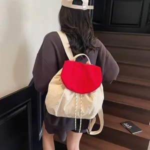Detailed view of Korean style lightweight nylon color block backpack for casual daily wear.