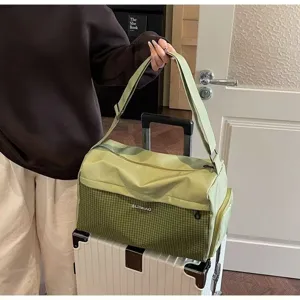 Large capacity travel duffel bag stylish green gym weekender bag for short trips and daily fitness.