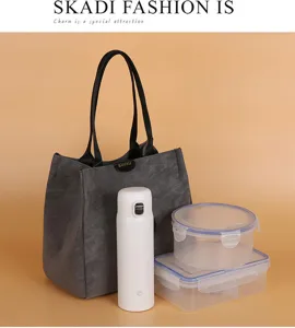 Canvas tote bag set with thermos and lunch box for daily commute and meal prep use stylish.