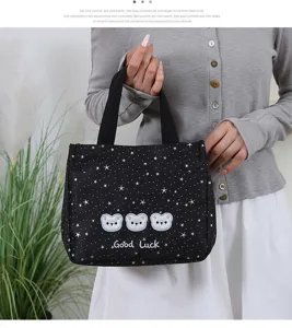 Large capacity black star print canvas tote bag with cute bear embroidery and handles.
