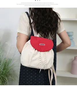 Stylish contrasting color backpack for women, casual canvas rucksack with drawstring.