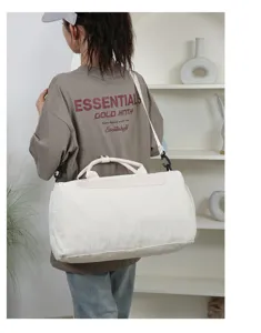Large capacity white travel duffel bag with strap, lightweight waterproof gym bag for daily use.