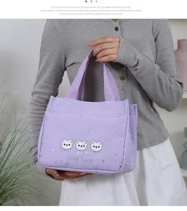 Purple canvas tote bag with cute star prints and bear patches, stylish and spacious for daily use.