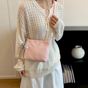 Women pink crossbody shoulder bag with star pattern, casual daily commute trendy handbag.