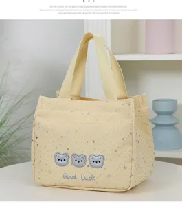 Canvas lunch tote bag with star print and cute bear embroidery for daily commute.