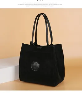 Stylish black handbag for women, versatile daily tote bag with top handles and chic design.