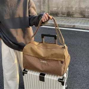 Large capacity travel duffel bag, casual sports gym luggage bag for short outdoor trips.