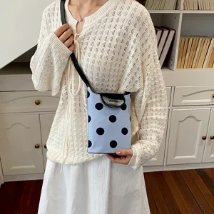 Light blue polka dot linen shoulder bag with black leather flap for daily casual wear