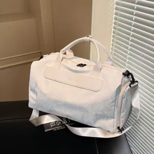 White gym duffel bag with wet dry separation for travel sports and daily fitness use portable.