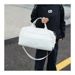 White travel duffel bag large capacity gym sports bag for women lightweight casual carry.