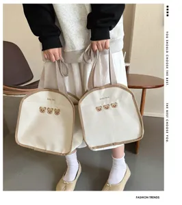 Korean ins canvas tote bag with cute bear embroidery, casual handbag and bento bag for daily use.