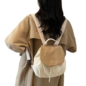 Casual nylon backpack back view, lightweight color-blocking daypack for women daily use.