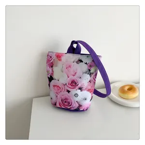 Canvas floral print bucket bag, casual small tote handbag for daily travel and shopping.
