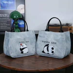 Cute cartoon panda printed lunch tote bag, denim texture waterproof handbag for daily office commute.