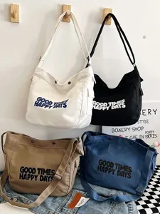 Casual canvas shoulder bag for women, large capacity tote bag with letter print, stylish daily commute.