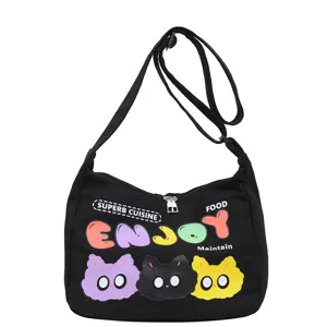 Borsa a tracolla in tela nera con stampe di gatti, grande borsa casual capiente e pratica.