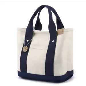 Canvas tote bag for women, multi-compartment lunch handbag and daily casual hand carrier.