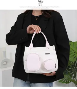 Casual canvas handbag with pink pockets, stylish shoulder tote bag for women daily use