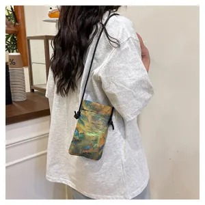 Mini crossbody phone bag with traditional Chinese landscape print, casual women accessory.