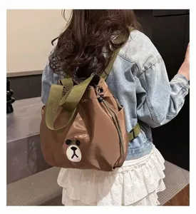 Casual brown backpack with cute bear patch, multi-functional travel school bag for women.