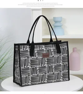 Casual black and white spoon print large capacity canvas tote bag for daily shopping and travel.