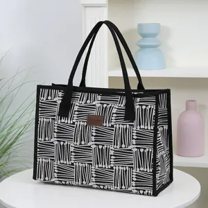 Stylish black and white pattern canvas tote bag, large capacity shoulder bag for women daily use.