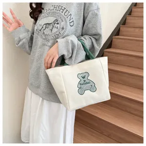 Korean style canvas tote bag for women, trendy casual shoulder bag with cute bear embroidery.