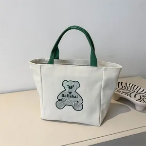 Casual canvas tote bag for women, stylish green handle shopper bag with cute bear print.