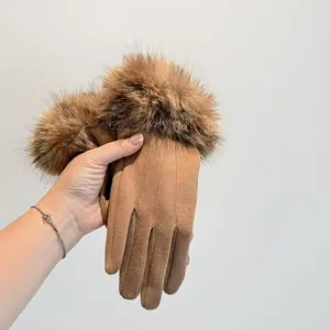 Women winter warm touch screen gloves with plush fur cuff and stylish brown suede finish.