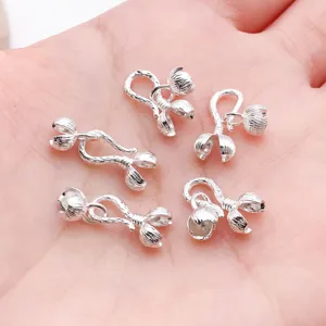 Silver DIY jewelry clasp connectors close-up detail view, high quality metal accessories.