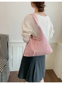 Roze suèdine hobo schoudertas voor dames, stijlvolle shopper voor werk en dagelijks gebruik.