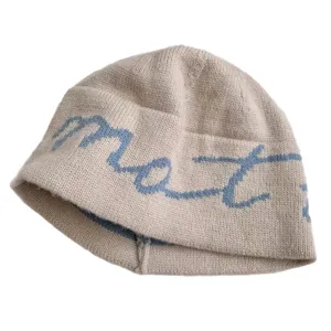 Korean style knit beanie with blue cursive letters, soft and cozy winter casual cold hat.