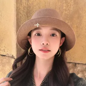 Classic brown wool bucket hat for women, wide brim dome cloche hat, stylish autumn winter headwear.