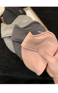 Detailed view of 3d windproof winter face mask, soft breathable fabric, warm ear cover.