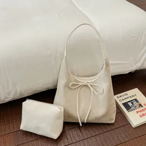 Grote suede schoudertas voor dames met stijlvolle strik en bijpassende tas voor dagelijks.