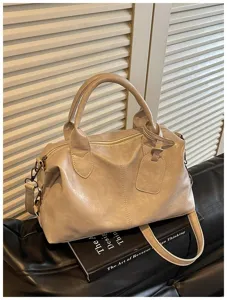 Vintage gewaxte lederen Boston handtas voor dames, chique schoudertas crossbody detail.