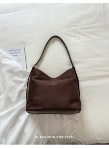 Brown suede shoulder bag for women, retro casual large capacity slouchy hobo tote design.