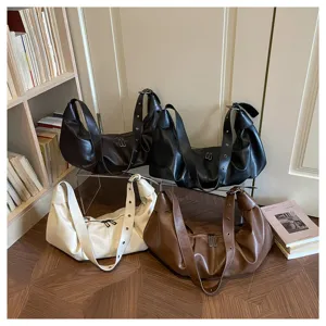 Gedetailleerd overzicht van casual slouchy hobo schoudertassen in diverse kleuren.