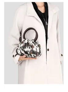 Retro niche geplooide koeienprint handtas wolk tas voor vrouwen mode dagelijks.