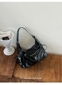Black PU leather shoulder bag with multi-zipper design, stylish casual commuter hobo bag.