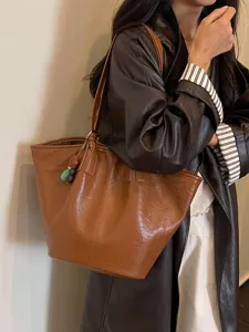 Casual bruine retro tote tas voor dames, grote stijlvolle schoudertas voor dagelijks gebruik.