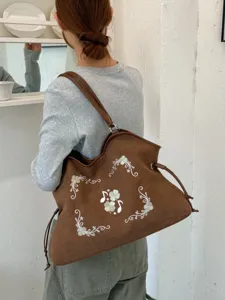 Bruine vintage suède geborduurde tas, grote capaciteit casual schoudertas voor dames.