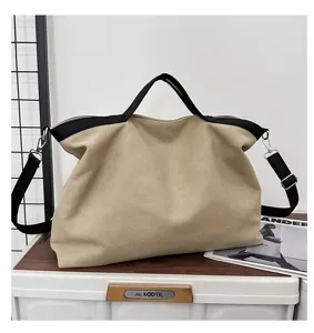 Casual canvas shopper, grote capaciteit forensentas, minimalistische schoudertas stijl.