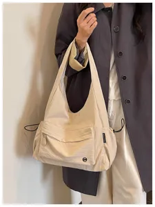 Borsa a tracolla casual in tela, borsa elegante e capiente per il commuting e l'uso quotidiano.